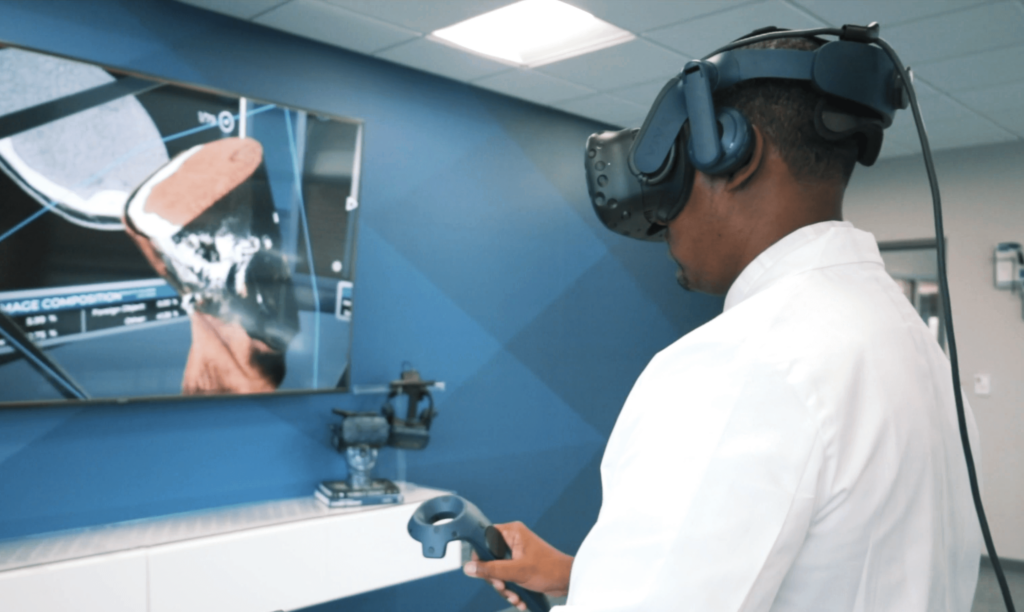 Doctor wearing VR Headset and using Clarus Viewer.